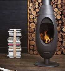 Печь-камин Invicta OVE стальная в интерьере Амазонка бай фото в Мозыре