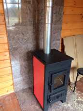 Купить стальной камин Везувий ПК-01 (270) в Мозыре фото в интерьере в Мозыре