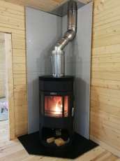Недорогой камин с отделкой шамотом Сибирь 12 фото в интерьере в Мозыре
