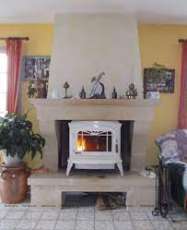 Печь-камин чугунный Invicta Bradford в интерьере Амазонка бай фото в Мозыре