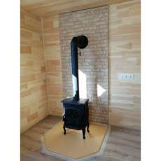 Чугунный камин со стеклом Сибирь 7 фото в интерьере в Мозыре