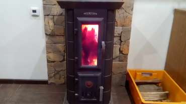 Стальная печь Термофор Статика Тетра, чёрная бронза фото в интерьере в Мозыре