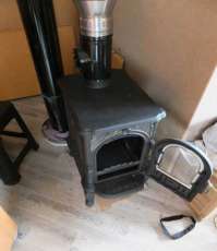 Недорогой печь-камин со стеклом Сибирь 6 фото в интерьере в Мозыре