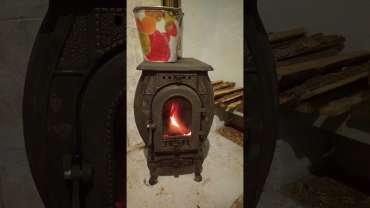 Печь отопительно-варочная чугунная "Сибирь" фото в интерьере в Мозыре