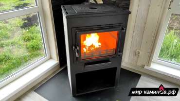 Недорогая печь-камин ЭТНА (Панорама) с плитой и теплообменником Амазонка бай фото в Мозыре