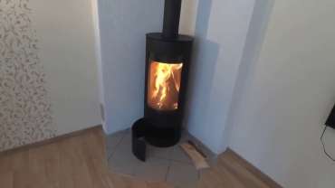 Стильная печь-камин с шамотом Мета-Бел Селигер в Мозыре фото в интерьере в Мозыре