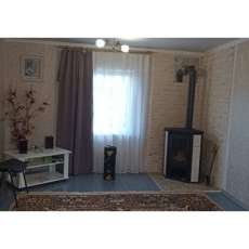 Стальной камин с шамотом Мета-Бел Ритм L фото в интерьере в Мозыре