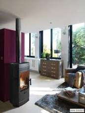 Печь-камин чугунный Invicta Gomont в интерьере Амазонка бай фото в Мозыре