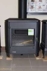 Печь-камин чугунный Invicta Carolo в интерьере Амазонка бай фото  в Мозыре