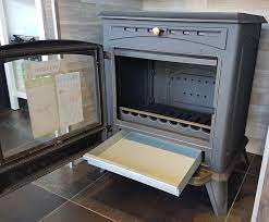 Печь-камин чугунный Invicta Altea в интерьере Амазонка бай фото в Мозыре