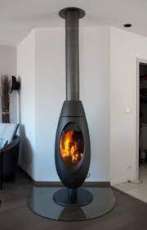 Печь-камин чугунный Invicta Ove в интерьере Амазонка бай фото в Мозыре