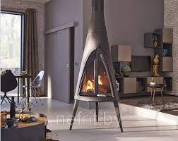 Печь-камин чугунный Invicta Pow-Wow в интерьере Амазонка бай фото в Мозыре