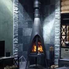 Печь-камин чугунный Invicta Pow-Wow в интерьере Амазонка бай фото в Мозыре