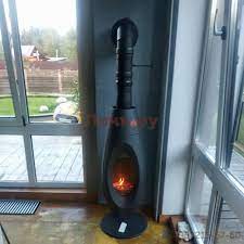 Печь-камин чугунный Invicta OVATIO в интерьере Амазонка бай фото в Мозыре